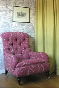 buttone back armchair in Lewis and Wood Fabric
